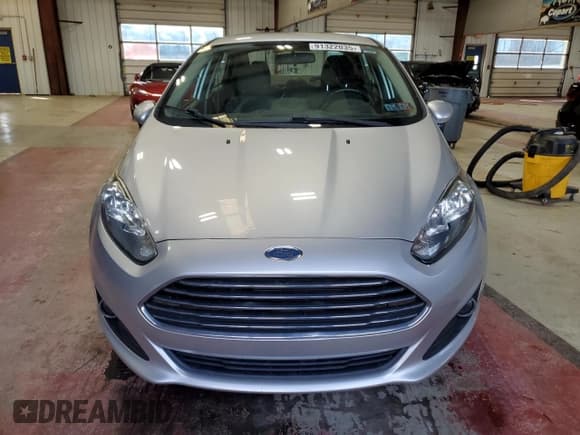 ✅ 2014 Ford Fiesta SE • VIN: 3FADP4BJ2EM189853 • Lot: 91322035. Wystawiony na Copart z przebiegiem 77 100 mil. Bezpłatny archiwum sprzedaży aukcyjnych z USA i szczegółowy raport historii pojazdu na DreamBid. Zdjęcie 5.