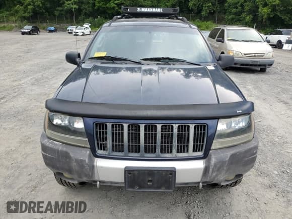 ✅ 2004 Jeep Grand Cherokee Laredo • VIN: 1J4GW48S64C160831 • Lot: 61920005. Wystawiony na Copart z przebiegiem 135 243 mil. Bezpłatny archiwum sprzedaży aukcyjnych z USA i szczegółowy raport historii pojazdu na DreamBid. Zdjęcie 5.