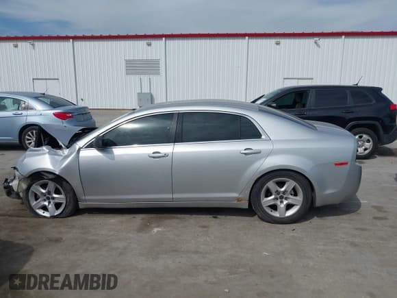 ✅ 2010 Chevrolet Malibu 1FL • VIN: 1G1ZA5E09AF278431 • Lot: 43355679. Listed on IAAI with 165,370 mi. Free auction sales archive from the USA and detailed vehicle history report at DreamBid. Image 14.