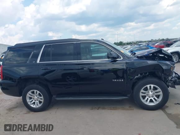 ✅ 2020 Chevrolet Tahoe LT • VIN: 1GNSCBKCXLR299233 • Lot: 43131742. Wystawiony na IAAI z przebiegiem 77 843 mil. Bezpłatny archiwum sprzedaży aukcyjnych z USA i szczegółowy raport historii pojazdu na DreamBid. Zdjęcie 13.
