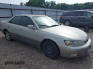 ✅ 1998 Lexus ES 300 • VIN: JT8BF28G9W5016146 • Lot: 42672230. Listed on IAAI with 303,819 mi. Free auction sales archive from the USA and detailed vehicle history report at DreamBid. Image 1.