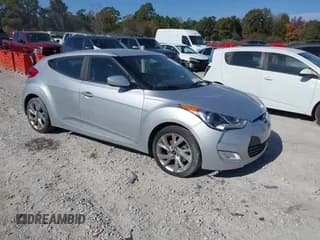 ✅ 2017 Hyundai Veloster Value Edition • VIN: KMHTC6ADXHU307359 • Lot: 43702500. Wystawiony na IAAI z przebiegiem 107 319 mil. Bezpłatny archiwum sprzedaży aukcyjnych z USA i szczegółowy raport historii pojazdu na DreamBid. Zdjęcie 1.