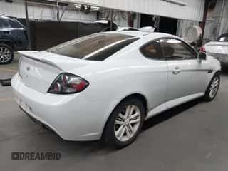 2008 Hyundai Tiburon GS с VIN KMHHM66D98U280005, выставлен на аукционе IAAI как лот 42580014 с пробегом 267 858 миль миль и . История ставок и продаж доступна на DreamBid. Изображение 4.