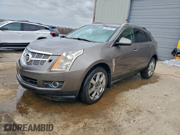 ✅ 2012 Cadillac SRX Performance Collection • VIN: 3GYFNBE37CS532590 • Lot: 94237585. Listed on Copart with 166,412 mi. Free auction sales archive from the USA and detailed vehicle history report at DreamBid. Image 1.