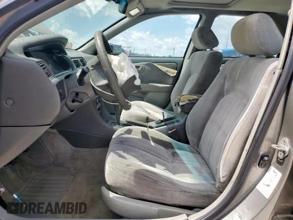 ✅ 1999 Toyota Camry LE • VIN: JT2BG22K4X0266090 • Lot: 71183525. Wystawiony na Copart z przebiegiem 219 373 mil. Bezpłatny archiwum sprzedaży aukcyjnych z USA i szczegółowy raport historii pojazdu na DreamBid. Zdjęcie 7.