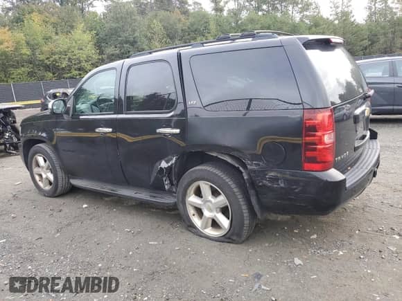 2008 Chevrolet Tahoe LTZ z VIN 1GNFK130X8R108064, wystawiony jako Copart lot #82318205 z przebiegiem 193 430 mil mil oraz Szkoda całkowita • Salvage title. Historia ofert i sprzedaży dostępna na DreamBid. Obrazek 2.