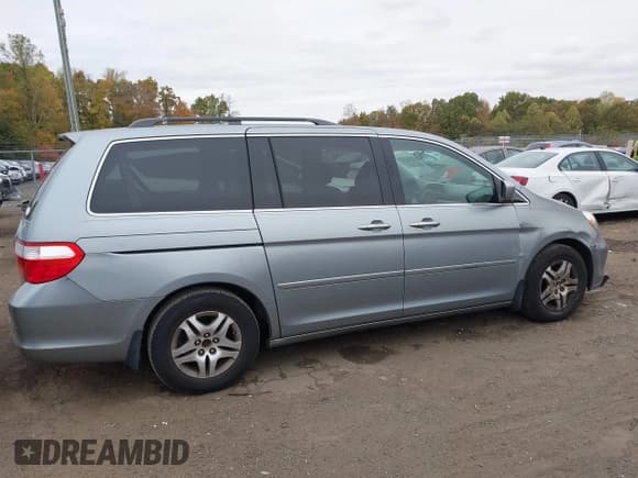 ✅ 2007 Honda Odyssey EX-L • VIN: 5FNRL38617B021380 • Лот: 43556943. Опубликован ранее на IAAI с пробегом 153 486 миль. Бесплатный доступ к архиву аукционных продаж из США и подробный отчёт об истории автомобиля на DreamBid. Изображение 13.