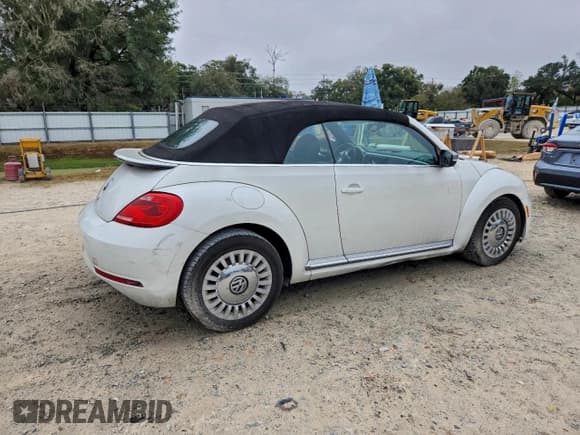 ✅ 2014 Volkswagen Beetle 2.0L TDI • VIN: 3VW5L7AT7EM818728 • Lot: 95842295. Listed on Copart with 151,324 mi. Free auction sales archive from the USA and detailed vehicle history report at DreamBid. Image 3.