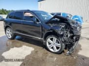 ✅ 2016 Volkswagen Touareg Lux • VIN: WVGEF9BP2GD012359 • Lot: 80117145. Wystawiony na Copart z przebiegiem Nie podano. Bezpłatny archiwum sprzedaży aukcyjnych z USA i szczegółowy raport historii pojazdu na DreamBid. Zdjęcie 4.