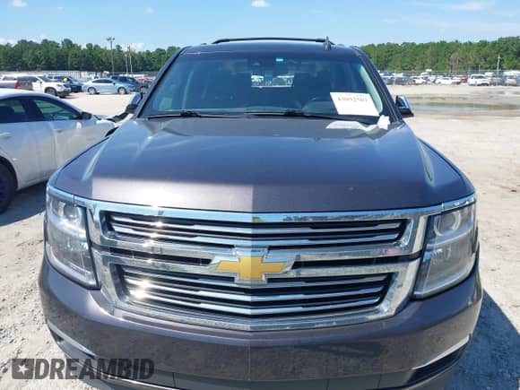 2017 Chevrolet Suburban Premier with VIN 1GNSKJKC1HR403063, listed as a IAAI auction lot 43092501 with 163,931 mi miles and . Bid and sale history available at DreamBid. Image 12.