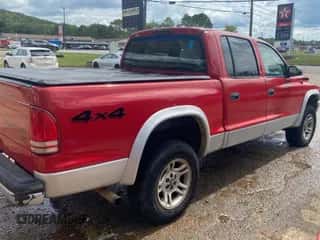 2004 Dodge Dakota SLT with VIN 1D7HG48N74S718165, listed as a Copart auction lot 73542004 with 213,326 mi miles and Clean title. Bid and sale history available at DreamBid. Image 4.