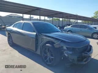 ✅ 2020 Dodge Charger SXT • VIN: 2C3CDXBG5LH249001 • Lot: 43419246. Listed on IAAI with 80,643 mi. Free auction sales archive from the USA and detailed vehicle history report at DreamBid. Image 1.