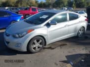 ✅ 2013 Hyundai Elantra GLS • VIN: KMHDH4AE2DU712239 • Lot: 43527627. Listed on IAAI with 115,551 mi. Free auction sales archive from the USA and detailed vehicle history report at DreamBid. Image 2.