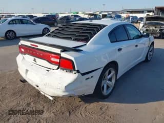 ✅ 2014 Dodge Charger SXT Plus • VIN: 2C3CDXHG8EH287560 • Lot: 43116564. Listed on IAAI with 194,629 mi. Free auction sales archive from the USA and detailed vehicle history report at DreamBid. Image 4.