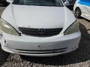 ✅ 2004 Toyota Camry LE • VIN: 4T1BF30K74U067120 • Lot: 86119765. Wystawiony na Copart z przebiegiem 157 686 mil. Bezpłatny archiwum sprzedaży aukcyjnych z USA i szczegółowy raport historii pojazdu na DreamBid. Zdjęcie 13.