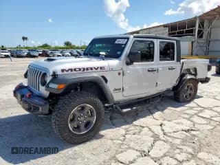 ✅ 2023 Jeep Gladiator Mojave • VIN: 1C6JJTEG7PL511309 • Lot: 85647035. Wystawiony na Copart z przebiegiem 28 327 mil. Bezpłatny archiwum sprzedaży aukcyjnych z USA i szczegółowy raport historii pojazdu na DreamBid. Zdjęcie 1.