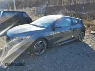 2019 Hyundai Veloster Turbo R-Spec z VIN KMHTH6AB1KU005997, wystawiony jako Copart lot #82587494 z przebiegiem 59 568 mil mil oraz Szkoda całkowita • Salvage title. Historia ofert i sprzedaży dostępna na DreamBid. Obrazek 1.