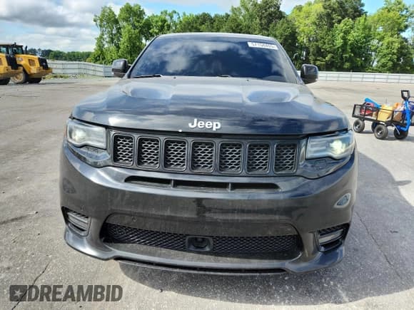✅ 2017 Jeep Grand Cherokee • VIN: NCS108376 • Lot: 57158405. Listed on Copart with 101,442 mi. Free auction sales archive from the USA and detailed vehicle history report at DreamBid. Image 5.