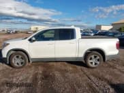 ✅ 2022 Honda Ridgeline RTL • VIN: 5FPYK3F50NB025921 • Lot: 43483259. Listed on IAAI with 45,266 mi. Free auction sales archive from the USA and detailed vehicle history report at DreamBid. Image 14.