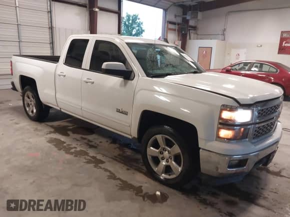 2015 Chevrolet Silverado 1500 LT z VIN 1GCRCREH0FZ398560, wystawiony jako IAAI lot #42454940 z przebiegiem 158 025 mil mil oraz . Historia ofert i sprzedaży dostępna na DreamBid. Obrazek 1.