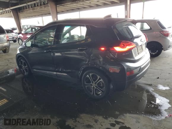 ✅ 2017 Chevrolet Bolt EV Premier • VIN: 1G1FX6S01H4136348 • Lot: 89660895. Listed on Copart with 77,383 mi. Free auction sales archive from the USA and detailed vehicle history report at DreamBid. Image 2.