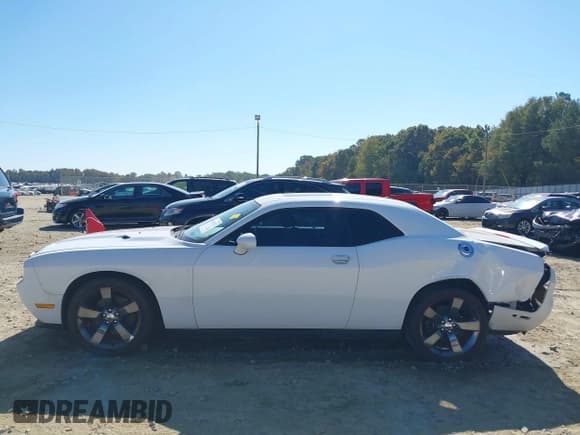 ✅ 2013 Dodge Challenger SXT • VIN: 2C3CDYAG6DH737253 • Lot: 40615411. Wystawiony na IAAI z przebiegiem 133 973 mil. Bezpłatny archiwum sprzedaży aukcyjnych z USA i szczegółowy raport historii pojazdu na DreamBid. Zdjęcie 14.