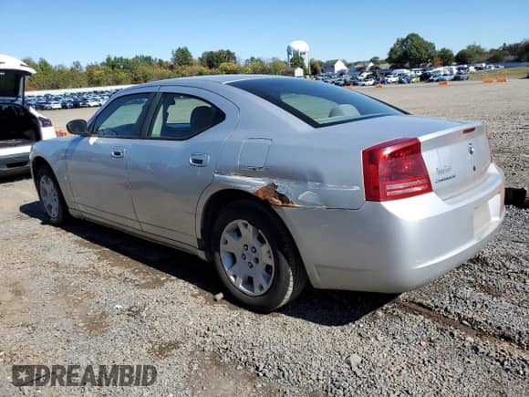 2007 Dodge Charger with VIN 2B3KA43GX7H668109, listed as a Copart auction lot 82256475 with 175,191 mi miles and Salvage title. Bid and sale history available at DreamBid. Image 2.