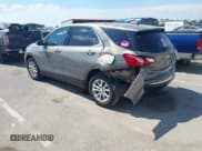 ✅ 2018 Chevrolet Equinox LT • VIN: 3GNAXJEV1JS564204 • Lot: 42823651. Listed on IAAI with 56,842 mi. Free auction sales archive from the USA and detailed vehicle history report at DreamBid. Image 3.