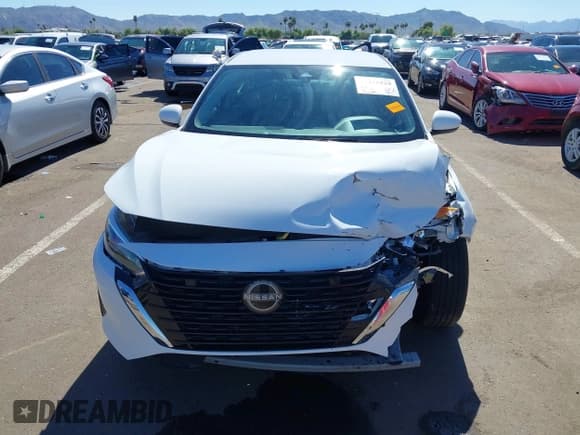 ✅ 2024 Nissan Sentra S • VIN: 3N1AB8BV1RY385869 • Lot: 43475929. Listed on IAAI with 19,708 mi. Free auction sales archive from the USA and detailed vehicle history report at DreamBid. Image 12.