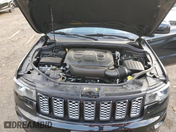 2021 Jeep Grand Cherokee Laredo X z VIN 1C4RJFAG7MC755492, wystawiony jako Copart lot #89878105 z przebiegiem 54 450 mil mil oraz Szkoda całkowita • Salvage title. Historia ofert i sprzedaży dostępna na DreamBid. Obrazek 12.