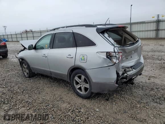 2010 Hyundai Veracruz Limited с VIN KM8NUDCC1AU122833, выставлен на аукционе Copart как лот 86812454 с пробегом Не указан миль и Списание • Salvage title. История ставок и продаж доступна на DreamBid. Изображение 2.