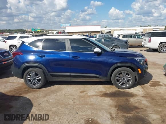 ✅ 2023 Kia Seltos S • VIN: KNDEU2AA2P7417960 • Лот: 43388910. Опубликован ранее на IAAI с пробегом 32 329 миль. Бесплатный доступ к архиву аукционных продаж из США и подробный отчёт об истории автомобиля на DreamBid. Изображение 13.