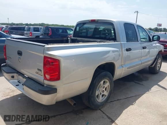 2006 Dodge Dakota SLT with VIN 1D7HE48N46S646527, listed as a IAAI auction lot 42680779 with 191,935 mi miles and . Bid and sale history available at DreamBid. Image 4.