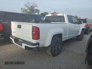 ✅ 2021 Chevrolet Colorado 2WD Work Truck • VIN: 1GCHSBEA2M1208553 • Лот: 63029544. Опубликован ранее на Copart с пробегом 100 094 миль. Бесплатный доступ к архиву аукционных продаж из США и подробный отчёт об истории автомобиля на DreamBid. Изображение 3.