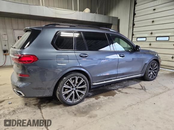 ✅ 2021 BMW X7 xDrive40i • VIN: 5UXCW2C00M9F02965 • Лот: 92995675. Опубликован ранее на Copart с пробегом 52 090 миль. Бесплатный доступ к архиву аукционных продаж из США и подробный отчёт об истории автомобиля на DreamBid. Изображение 3.