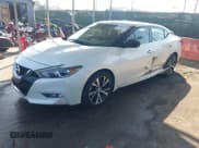 ✅ 2016 Nissan Maxima SR • VIN: 1N4AA6AP9GC390031 • Lot: 42801765. Wystawiony na IAAI z przebiegiem 104 722 mil. Bezpłatny archiwum sprzedaży aukcyjnych z USA i szczegółowy raport historii pojazdu na DreamBid. Zdjęcie 2.