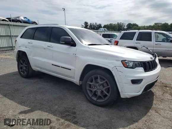 2021 Jeep Grand Cherokee 80th Anniversary z VIN 1C4RJFBG1MC810453, wystawiony jako Copart lot #81626215 z przebiegiem Nie podano mil oraz Szkoda całkowita • Salvage title. Historia ofert i sprzedaży dostępna na DreamBid. Obrazek 4.