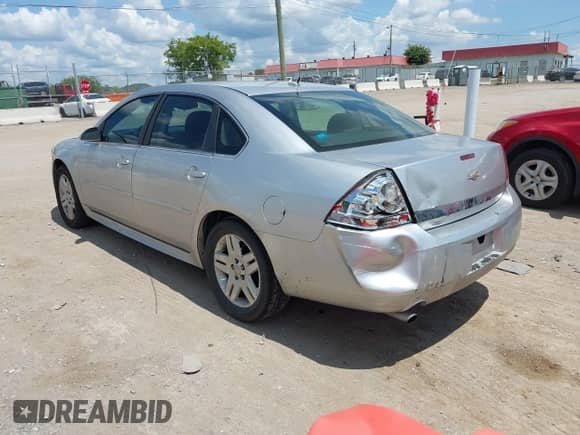 2012 Chevrolet Impala LT Fleet z VIN 2G1WG5E36C1142618, wystawiony jako IAAI lot #42926695 z przebiegiem 249 961 mil mil oraz . Historia ofert i sprzedaży dostępna na DreamBid. Obrazek 3.