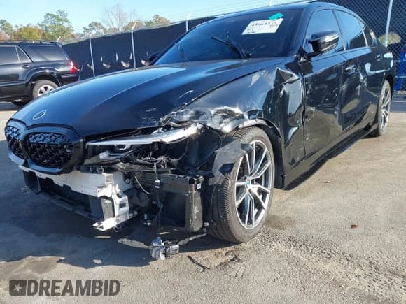 ✅ 2021 BMW 3 Series 330i • VIN: 3MW5R1J02M8C00810 • Lot: 43664365. Listed on IAAI with 48,765 mi. Free auction sales archive from the USA and detailed vehicle history report at DreamBid. Image 6.