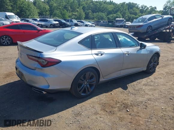 ✅ 2021 Acura TLX w/A-Spec Package • VIN: 19UUB5F52MA008985 • Lot: 42954581. Listed on IAAI with 28,221 mi. Free auction sales archive from the USA and detailed vehicle history report at DreamBid. Image 4.