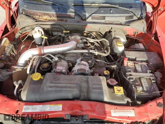 2003 Dodge Dakota SLT с VIN 1D7HG48NX3S345590, выставлен на аукционе Copart как лот 70002875 с пробегом 437 659 миль миль и Чистый • Clean title. История ставок и продаж доступна на DreamBid. Изображение 11.