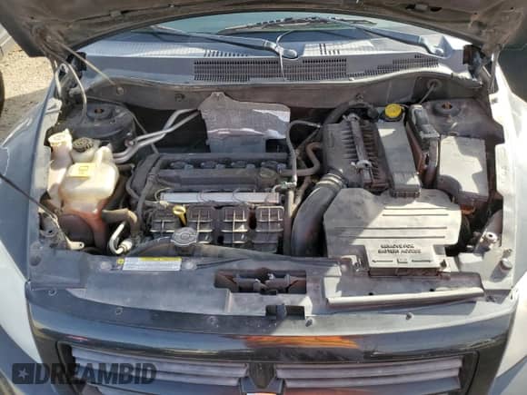 2008 Dodge Caliber SE with VIN 1B3HB28CX8D770378, listed as a Copart auction lot 87323734 with 171,414 mi miles and Salvage title. Bid and sale history available at DreamBid. Image 11.