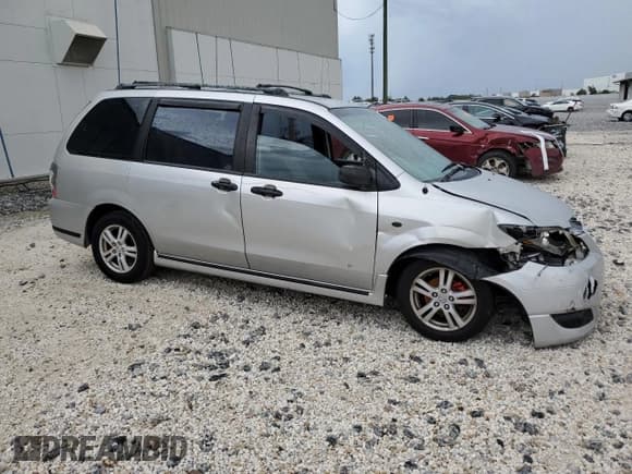 ✅ 2005 Mazda MPV LX • VIN: JM3LW28A450553950 • Lot: 83827135. Wystawiony na Copart z przebiegiem Nie podano. Bezpłatny archiwum sprzedaży aukcyjnych z USA i szczegółowy raport historii pojazdu na DreamBid. Zdjęcie 4.