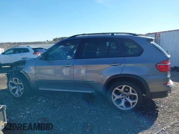 ✅ 2012 BMW X5 35d • VIN: 5UXZW0C59CL663582 • Lot: 43671625. Listed on IAAI with 193,230 mi. Free auction sales archive from the USA and detailed vehicle history report at DreamBid. Image 14.