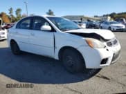 ✅ 2011 Kia Rio LX • VIN: KNADH4A31B6948446 • Lot: 76391634. Listed on Copart with 203,358 mi. Free auction sales archive from the USA and detailed vehicle history report at DreamBid. Image 4.