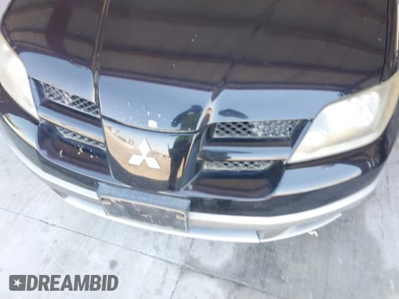 ✅ 2004 Mitsubishi Outlander LS • VIN: JA4LX31F74U002513 • Lot: 42973712. Listed on IAAI with 138,336 mi. Free auction sales archive from the USA and detailed vehicle history report at DreamBid. Image 6.