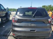 ✅ 2017 Ford Escape SE • VIN: 1FMCU0GDXHUA48700 • Лот: 56953235. Опубликован ранее на Copart с пробегом 99 507 миль. Бесплатный доступ к архиву аукционных продаж из США и подробный отчёт об истории автомобиля на DreamBid. Изображение 6.