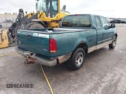 ✅ 1997 Ford F-150 XL • VIN: 1FTEX17LXVNC32588 • Lot: 40848063. Wystawiony na IAAI z przebiegiem 210 113 mil. Bezpłatny archiwum sprzedaży aukcyjnych z USA i szczegółowy raport historii pojazdu na DreamBid. Zdjęcie 4.