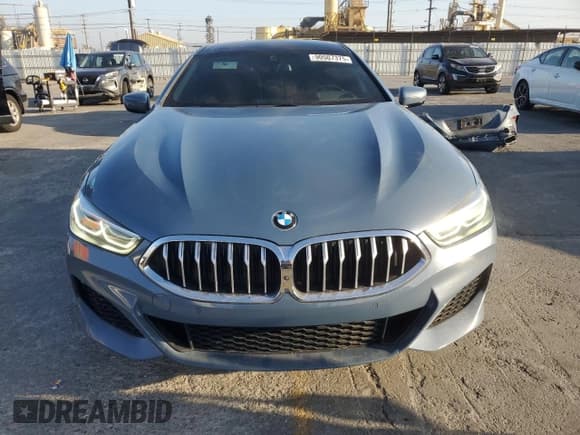 ✅ 2022 BMW 8 Series 840i • VIN: WBAGV2C04NCJ85650 • Lot: 90507375. Wystawiony na Copart z przebiegiem 65 947 mil. Bezpłatny archiwum sprzedaży aukcyjnych z USA i szczegółowy raport historii pojazdu na DreamBid. Zdjęcie 5.