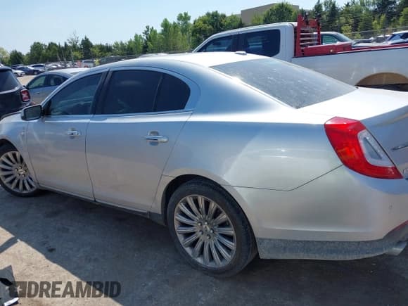 ✅ 2015 Lincoln MKS • VIN: 1LNHL9DK8FG608211 • Lot: 43154019. Listed on IAAI with 152,341 mi. Free auction sales archive from the USA and detailed vehicle history report at DreamBid. Image 15.